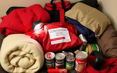 winter survival tips: Compact winter emergency kit for apartment dwellers featuring blankets, flashlights, and canned food.